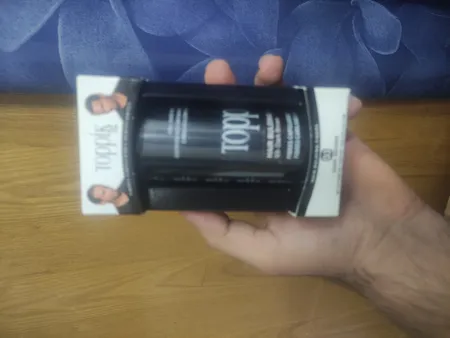 پودر پرپشت کننده مو تاپیک هیر فیلر کد 03 وزن 25 گرم رنگ قهوه ای تیره