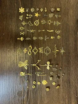 آویز دستبند مدل دنیای زیبا کد AD 0145 مجموعه 60 عددی