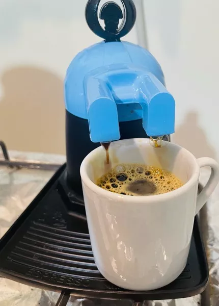 قهوه جوش مدل روگازی طرح عروسکی به همراه فنجان