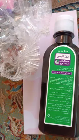 محلول ضد شپش مو نولایس مدل 03 حجم 200 میلی لیتر