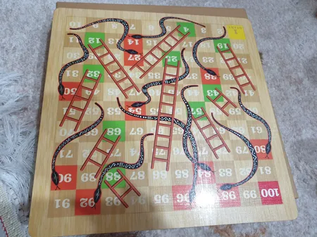 بازی منچ و مارپله کلاسیک تخته چوبی مدل Animals