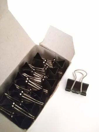 گیره کاغذ دینگ لی مدل DL.0006 سایز 15 میلی متر بسته 12 عددی