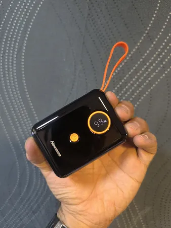 پاوربانک 22.5 وات نیوماین مدل AL07 ظرفیت 10000 میلی آمپر ساعت