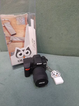 فلش مموری طرح دوربین عکاسی نیکون مدل Ultita -CN01 ظرفیت 32 گیگابایت