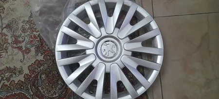 قالپاق خودرو ابویی کد abarya14 سایز 14 اینچ مناسب برای پژو مجموعه 4 عددی