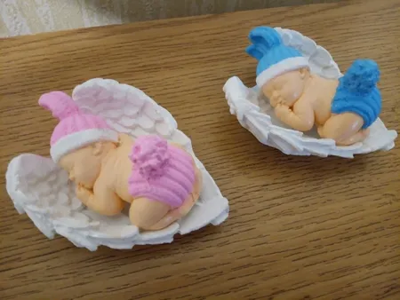 مجسمه سنگی مدل نوزاد روی بال فرشته