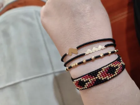 دستبند طلا 18 عیار دخترانه مدل قلب در قلب