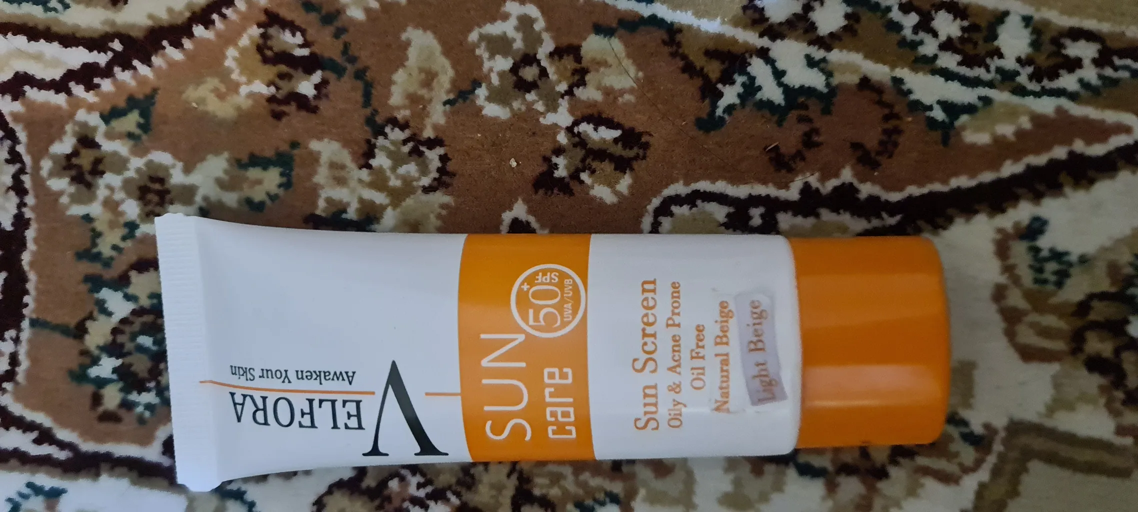 کرم ضد آفتاب رنگی  ولفرا spf50 مدل 05 مناسب پوست های چرب و حساس وزن 40 گرم