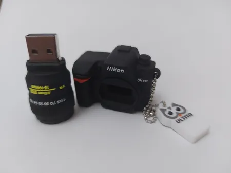 فلش مموری طرح دوربین عکاسی نیکون مدل Ultita -CN01 ظرفیت 32 گیگابایت
