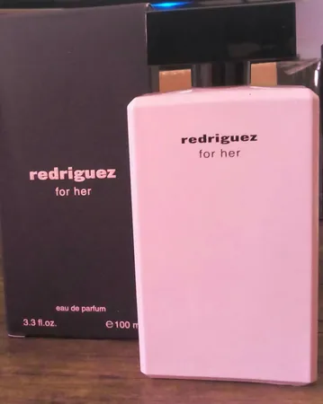 ادو پرفیوم زنانه فراگرنس ورد مدل Redriguez For Her حجم 100 میلی لیتر