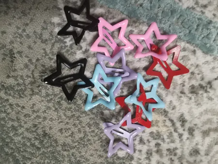 گیره مو دخترانه مدل تق تقی ستاره ای پاستیلی بسته 10 عددی