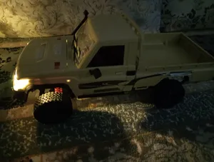 تجریه خرید ماشین بازی کنترلی ام ان مدل وانت تویوتا لندکروز