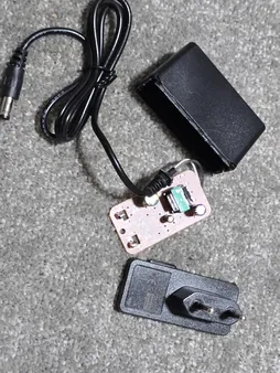 آداپتور 12 ولت 2 آمپر دی ای پی مدل dk1203_shenzhen