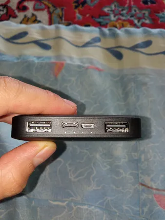 پاوربانک 10 وات شیائومی مدل Redmi ظرفیت 10000 میلی آمپر ساعت به همراه کابل تبدیل microUSB