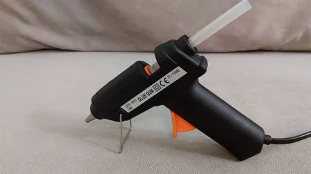 دستگاه چسب تفنگی جانسون مدل FL-138B به همراه یک عدد چسب حرارتی جانسون بصورت رایگان