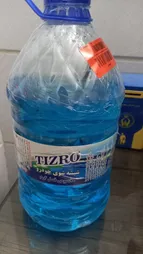 مایع تمیز کننده شیشه خودرو تیزرو صنعت مدل فصل گرم حجم 4 لیتر