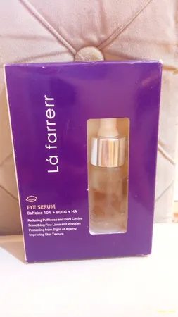 سرم روشن کننده و کاهش دهنده پف دور چشم لافارر مدل کافئین و هیالورونیک اسید حجم 15 میلی لیتر