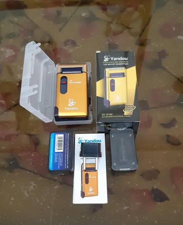 ماشین اصلاح موی صورت یاندو مدل SV-316U به همراه تیغه و توری یدک