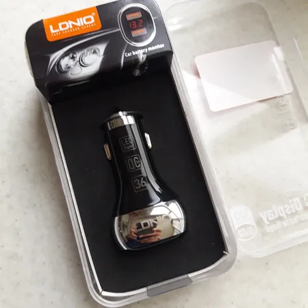 شارژر فندکی الدینیو مدل C2 به همراه کابل تبدیل microUSB