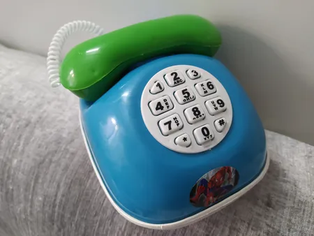 قلک طرح اسباب بازی تلفن و ماشین