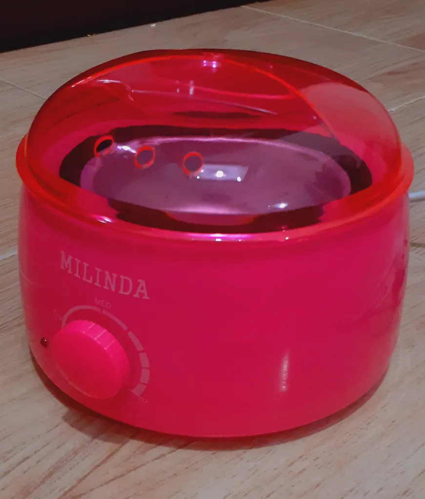 دستگاه ذوب وکس میلیندا مدل 121