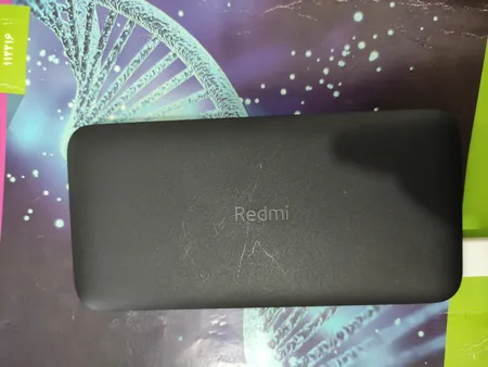 پاوربانک شیائومی مدل Redmi ظرفیت 10000 میلی آمپر ساعت به همراه کابل تبدیل microUSB
