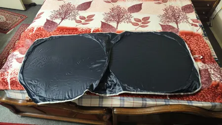 آفتابگیر شیشه جلو خودرو مدل عینکی کد 2023