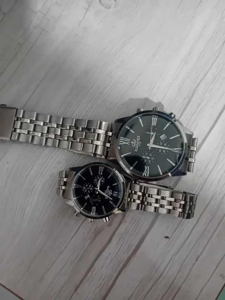 ست ساعت مچی عقربه ای زنانه و مردانه مدل کوارتز موتور تقویم دار بند فلزی کد 1