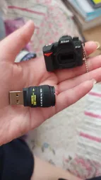 فلش مموری طرح دوربین عکاسی نیکون مدل Ultita -CN01 ظرفیت 32 گیگابایت