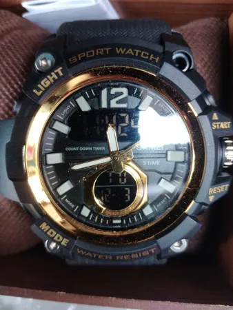 ساعت مچی عقربه ای زنانه و مردانه اسکمی مدل 1725BKGD