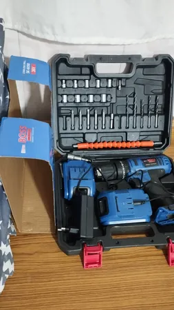 دریل شارژی چکشی باس مدل SK-6050 مجموعه 28 عددی