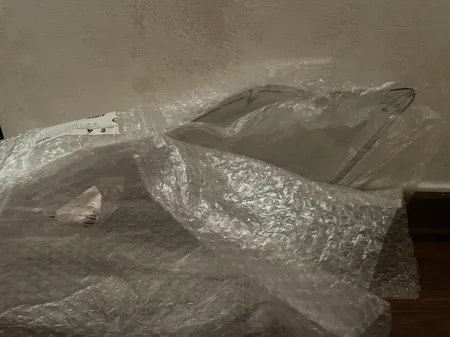 طلق چراغ جلو خودرو مدل فابریک مناسب برای تیبا بسته 2 عددی