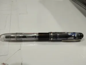 تجریه خرید خودنویس دلار شفاف مدل 717i