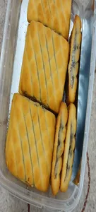 تجریه خرید شیرینی کلمپه خرمایی برنجی بازار دهکده - 650 گرم