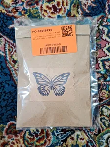 تجریه خرید مهر لینو  مدل دستساز طرح پروانه