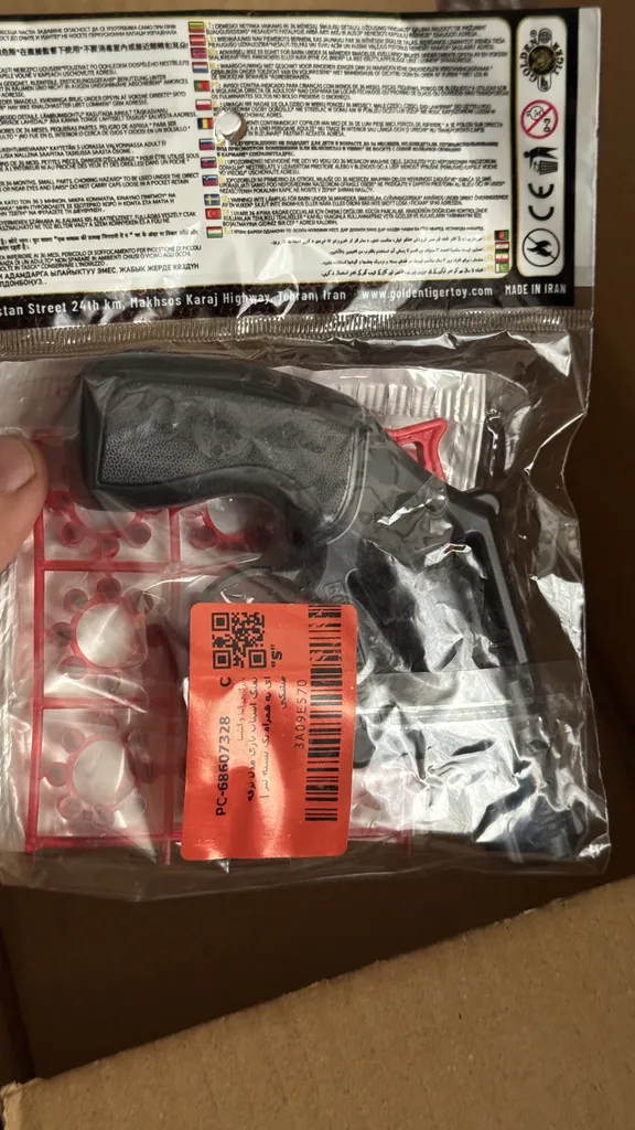 تفنگ اسباب بازی مدل ترقه ای به همراه یک بسته تیر