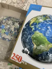 تجریه خرید پازل 250 تکه فنسي مدل زمين طرح گرد