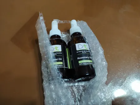 روغن مو دکترتی مدل رزماری حجم 50 میلی لیتر به همراه روغن مو دکترتی مدل نارگیل حجم 50 میلی لیتر