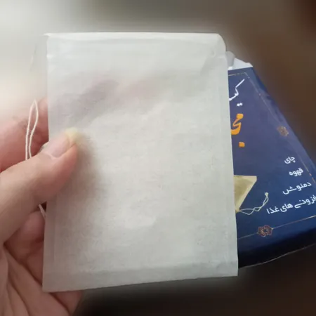 فیلتر چای مجلل مدل نخ دار بسته 50 عددی