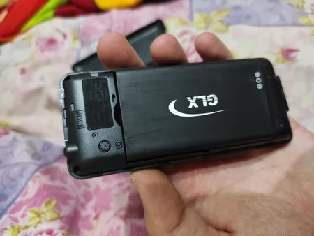 گوشی موبایل جی ال ایکس مدل iT5606 دو سیم کارت ظرفیت 32 مگابایت و رم 32 مگابایت