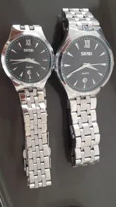 تجریه خرید ست ساعت مچی عقربه ای زنانه و مردانه اسکمی مدل 9071