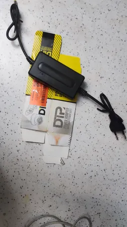 آداپتور 12 ولت 2 آمپر دی ای پی مدل dk1203_shenzhen