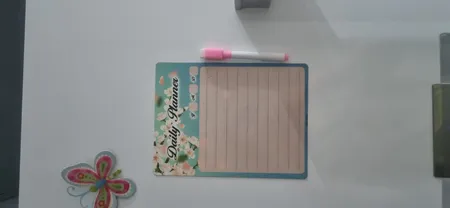 تخته وایت برد مدل پلنر مگنتی برنامه ریز رو یخچالی طرح شکوفه کد 6 سایز 14x19 سانتی متر به همراه ماژیک