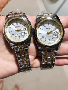 تجریه خرید ست ساعت مچی زنانه و مردانه اسکمی مدل  9098 کد 02