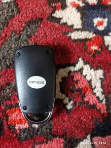 تجریه خرید ریموت بلوتوثی درب پارکینگ مدل AZ-433