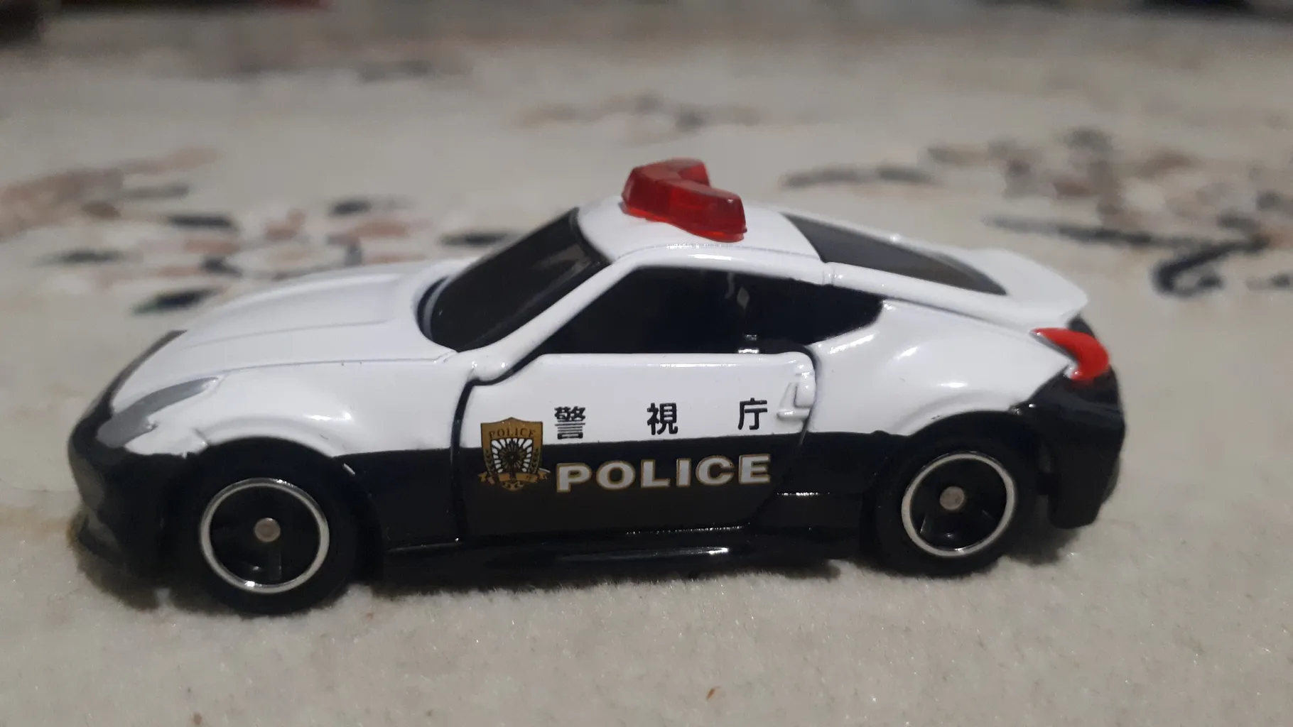 ماشین بازی تاکارا تامی مدل Nissan Fairlady Z Nismo Police Car کد 859963