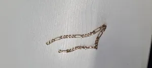 تجریه خرید دستبند زنجیری طلا 18 عیار زنانه ماوی گالری مدل فیگارو برلین