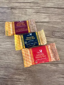 تجریه خرید کنجد عسلی پذیرایی عقاب 10 گرم بسته 32 عددی