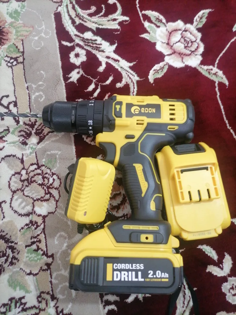 دریل پیچ گوشتی شارژی چکشی ادون مدل 18TS بسته 36 عددی