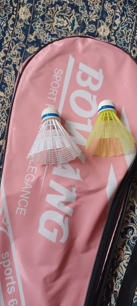 راکت بدمینتون مدل بوانگ به همراه توپ بدمینتون بسته 4 عددی